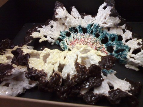 coloured doily, brown and blue